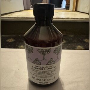 Davines Naturaltech Calming Shampoo with Purple and Black Design